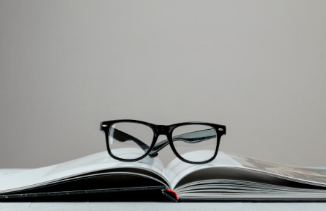 Open Book With Glasses